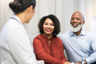 couple talking with a doctor